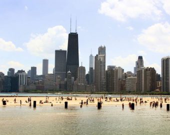 image of ocean with city in the background