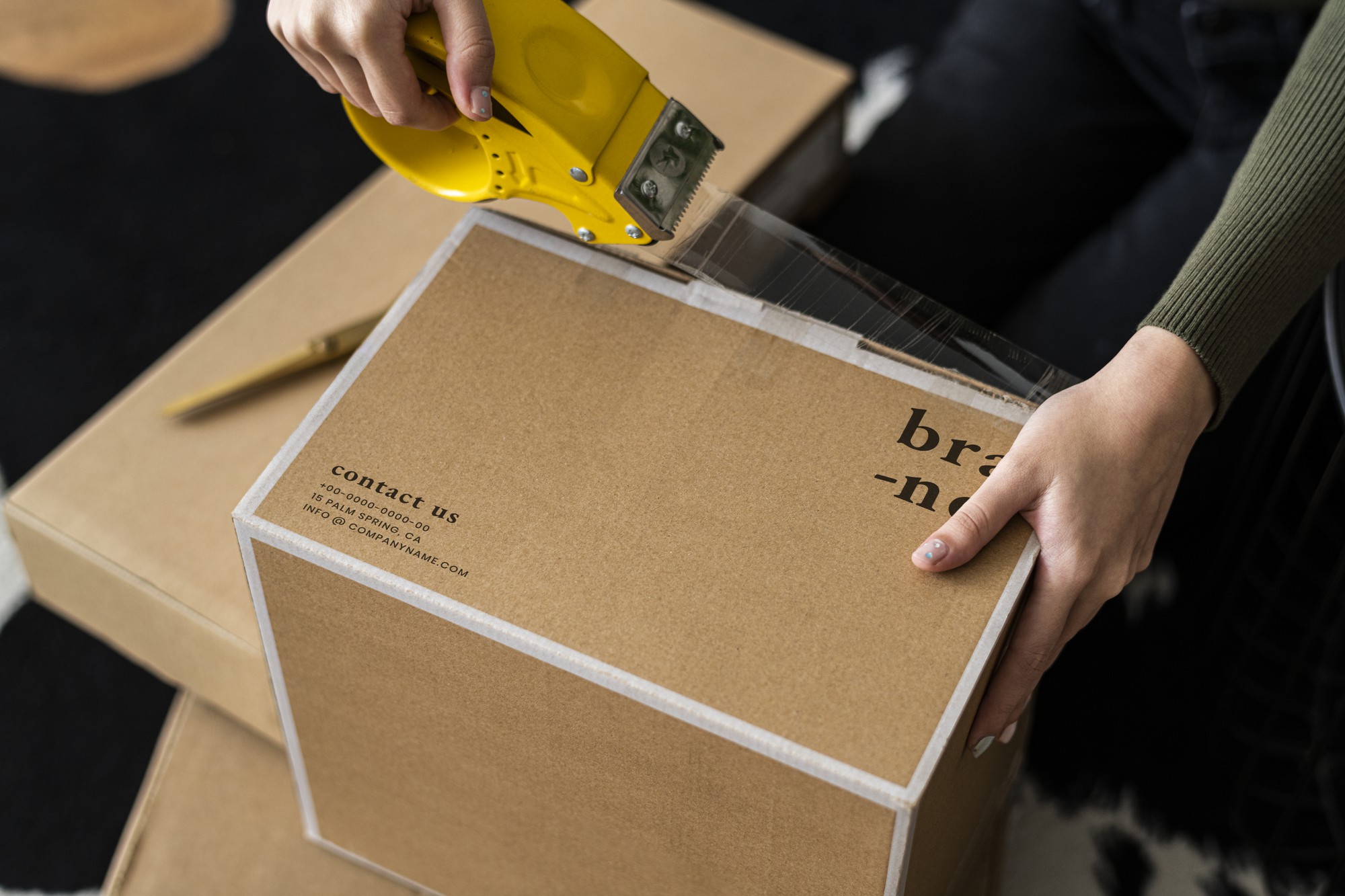 small business owner packing product parcel boxes delivery